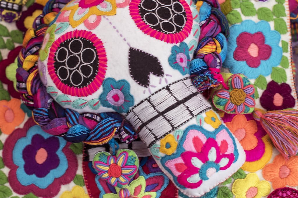 This Dia de Los Muertos pillow was hand sown by a local artisan at the San Cristobal de las Casas market, where retreat participants will be experiencing exercises that allow them to feel passion, adventure, and embodiment, as a means to increase their empowerment
