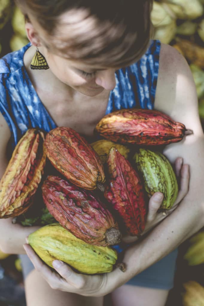 Ava cradles many varieties of cacao pods in her amrs, deep in the forest in southern Mexico. She is informing the reader about what inspiring, wild, adventurous, experiences will be offered in Chiapas Chocolate Retreats